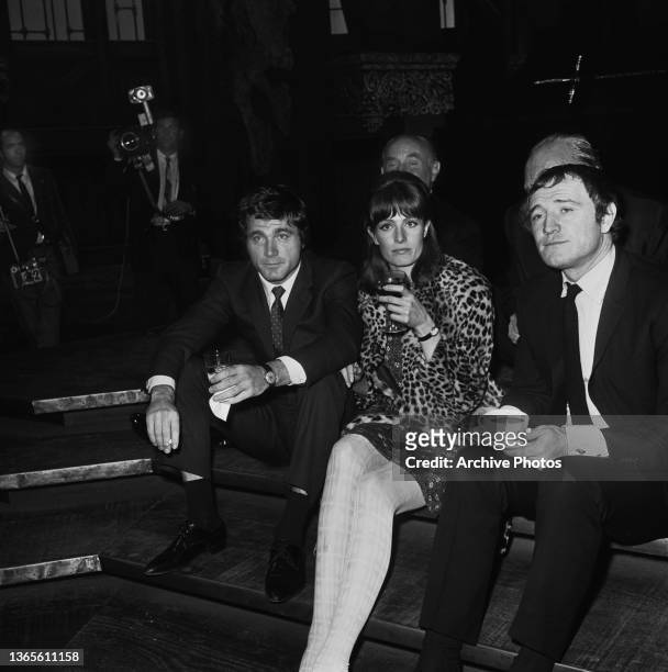 English actress Vanessa Redgrave with actors Franco Nero and Richard Harris at a press party for the musical film 'Camelot', in which they all star,...