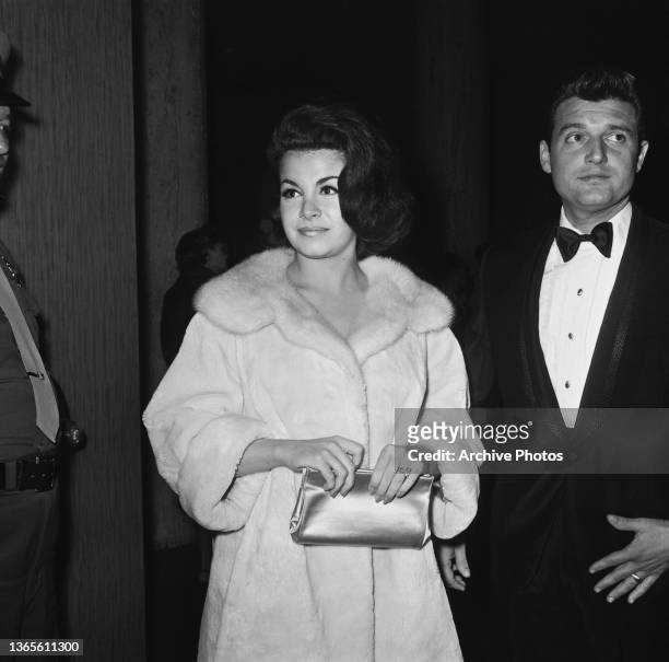 American actress and singer Annette Funicello and her husband Jack Gilardi attend a Screen Producers Guild dinner, USA, 1965.