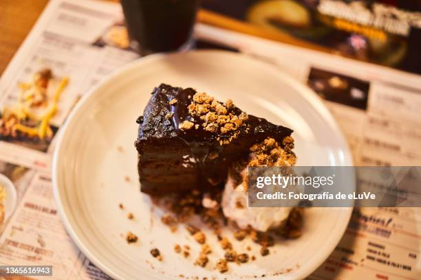 close-up of chocolate cake on table - chocolate pie stock pictures, royalty-free photos & images