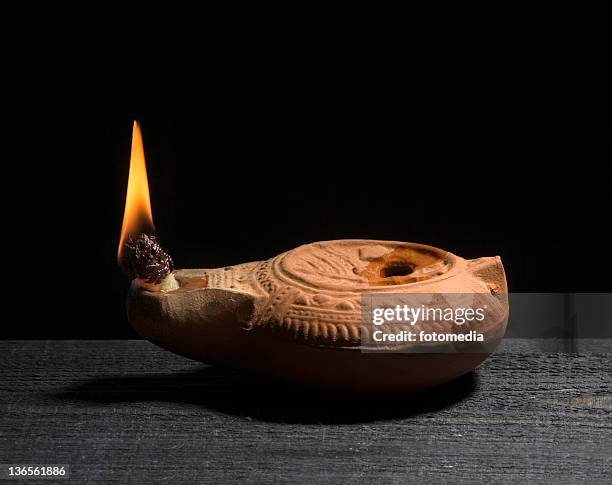 oil lamp - ancient pottery stock pictures, royalty-free photos & images