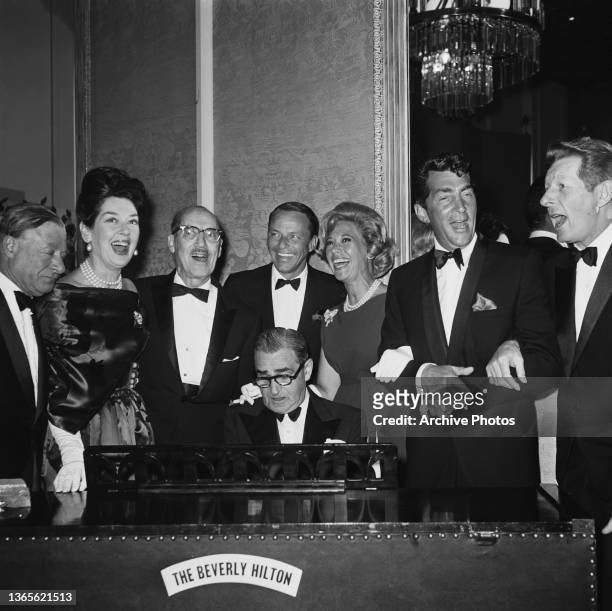 Russian American composer Irving Berlin performs for actors George Jessel, Rosalind Russell, Groucho Marx, Frank Sinatra, Dinah Shore, Dean Martin...