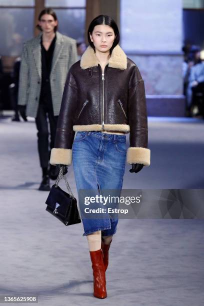 Model walks the runway during the Ami Menswear Fall/Winter 2022-2023 show as part of Paris Fashion Week on January 19, 2022 in Paris, France.