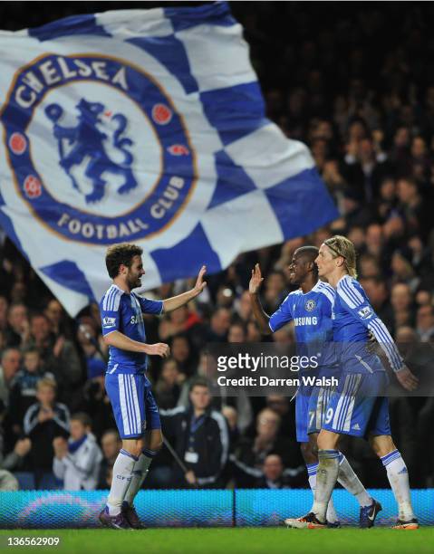 Juan Mata and Fernando Torres congratulate Ramires of Chelsea on scoring their third goal during the Budweiser sponsored FA Cup third round match...