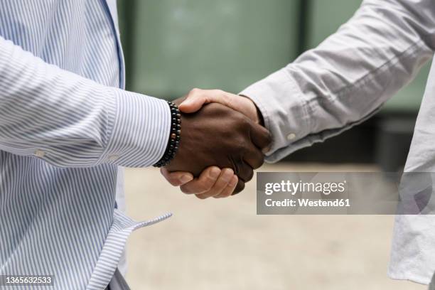 Multi Handshake 1,104 Multi Racial Handshake Closeup Stock Photos, High-Res Pictures ...