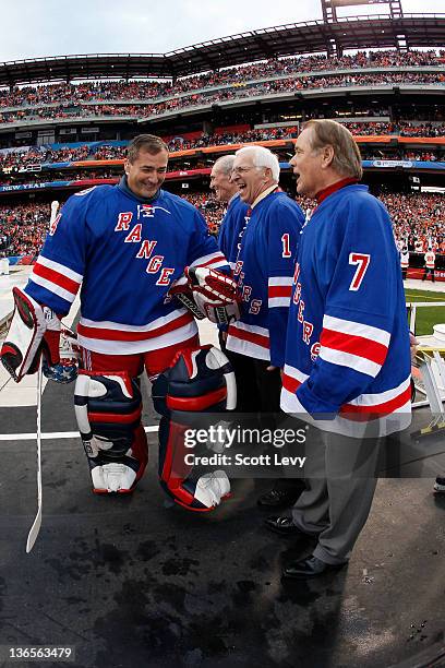 John Vanbiesbrouck and ambassadors Harry Howell, Ed Giacomin and Rod Gilbert of the New York Rangers prior to the game against the Philadelphia...