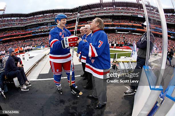 Adam Graves and ambassadors Harry Howell, Ed Giacomin and Rod Gilbert of the New York Rangers prior to the game against the Philadelphia Flyers...