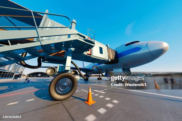 three dimensional render of passenger boarding bridge connected to airplane waiting at airport - airport stock illustrations