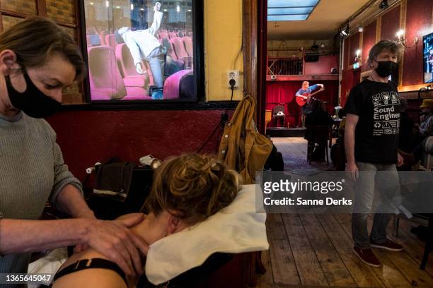 Massage is given in 'De Roode Bioscoop' a small theatre, on January 19, 2022 in Amsterdam, Netherlands. The country's cultural venues, such as...