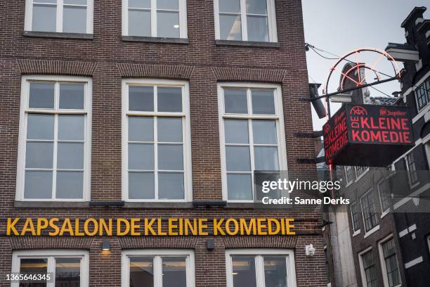 The protest action 'Kapsalon Theater' is announced on the outside of de Kleine Komedie on January 19, 2022 in Amsterdam, Netherlands. The country's...