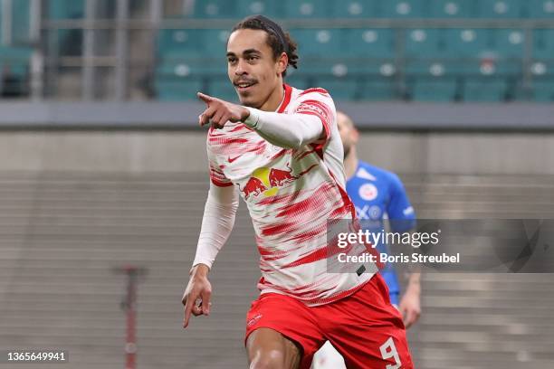 Yussuf Poulsen of Leipzig celebrates scoring the opening goal during the DFB Cup round of sixteen match between RB Leipzig and Hansa Rostock at Red...