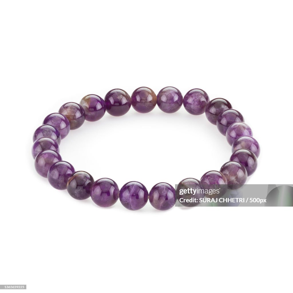 High angle view of necklace against white background