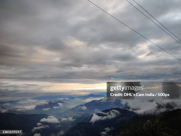 the sikkim mountains,scenic view of mountains against sky during sunset,sikkim,india - dhl stock pictures, royalty-free photos & images