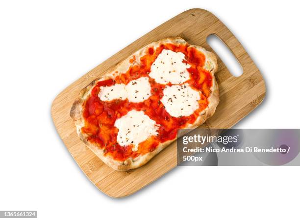 square pizza or pinza romana,high angle view of pizza on cutting board over white background,italy - origan stock pictures, royalty-free photos & images