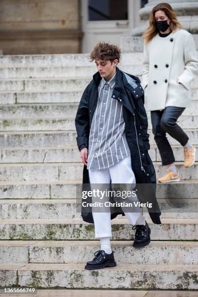 Maxence Danet-Fauvel is seen outside AMI Paris during Paris Fashion Week - Menswear F/W 2022-2023 on January 19, 2022 in Paris, France.