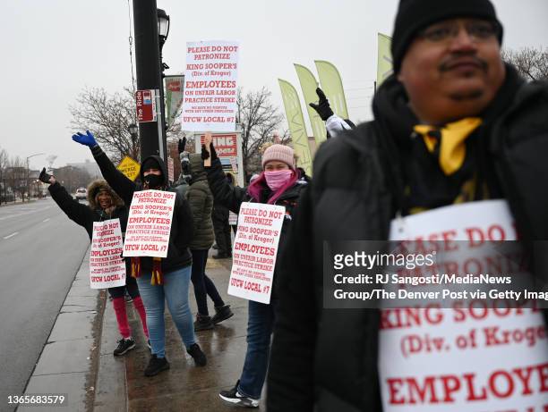 King Soopers employees, at 5301 W 38th Ave., walk the picket line on January 19, 2022 in Wheat Ridge, Colorado.