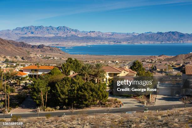 Lake Mead is viewed from a hillside in town on January 11, 2022 in Boulder City, Nevada. Boulder City, located in Clark County, near Lake Mead and...