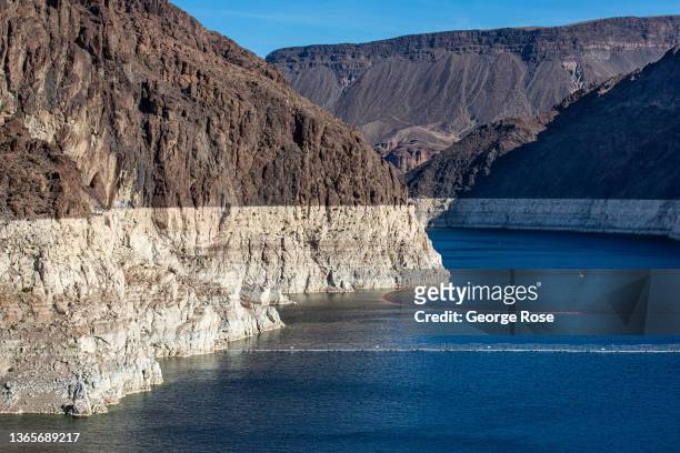 Bathtub ring" caused by the drought has formed in the canyone near the massive concrete Hoover Dam, creating Lake Mead on the Colorado River, are...
