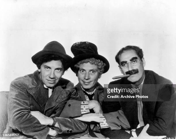 The three best known members of American comedy act the Marx Brothers, circa 1935. Left to right, Chico , Harpo and Groucho Marx .