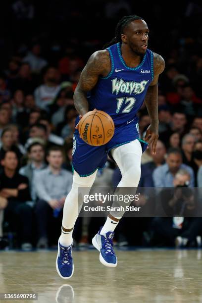 Taurean Prince of the Minnesota Timberwolves dribbles during the first half against the New York Knicks at Madison Square Garden on January 18, 2022...