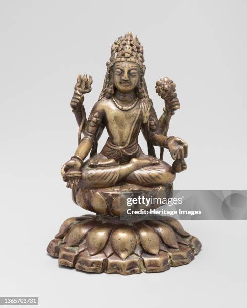 Four-Armed Bodhisattva Avalokiteshvara Seated in Lotus Position , 8th/9th century. Khyber Pakhtunkhwa Province, Swat Valley . Artist Unknown.