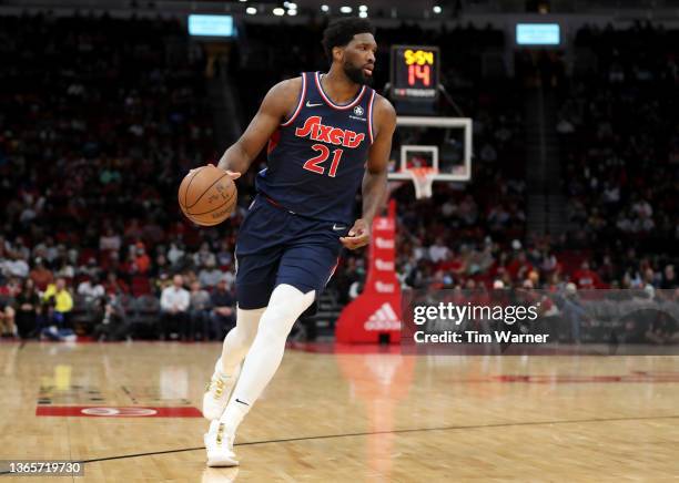 Joel Embiid of the Philadelphia 76ers dribbles the ball in the second half against the Houston Rockets at Toyota Center on January 10, 2022 in...