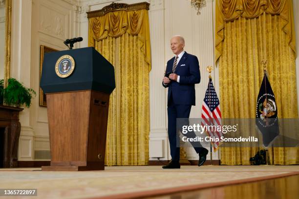 President Joe Biden walks to the lectern at the beginning of a news conference in the East Room of the White House on January 19, 2022 in Washington,...