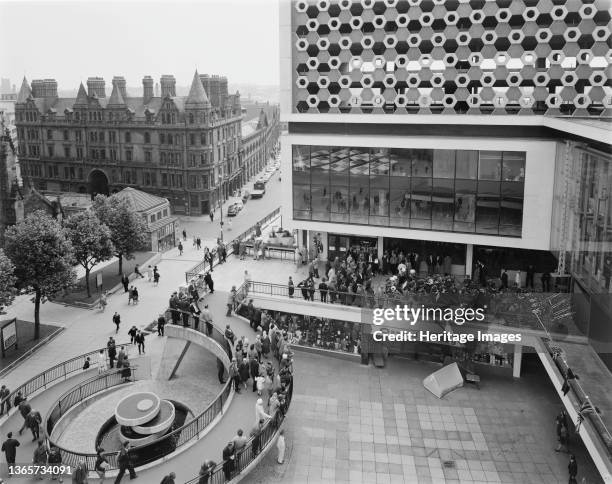 Bull Ring Centre, Birmingham, . A RAF band performing at the east court of the Bull Ring Centre, with shoppers watching from the spiral ramp in the...