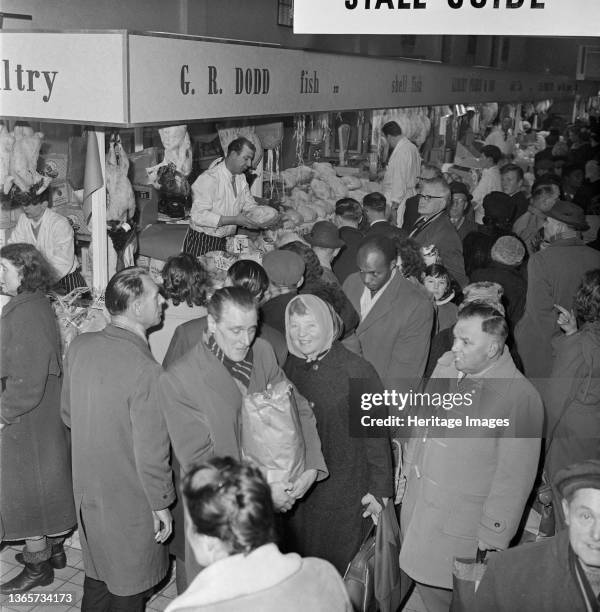 Bull Ring Centre, Birmingham, . The fish and poultry market at the Bull Ring Centre bustling with shoppers at Christmas time. On 14th November 1963,...