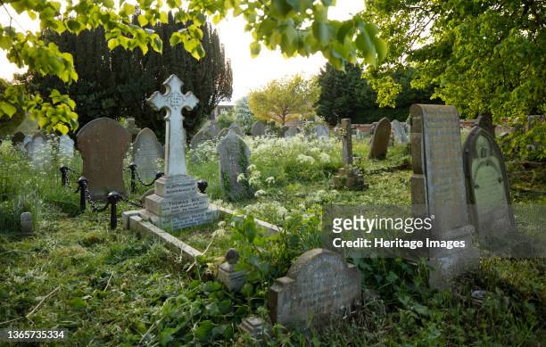 Gravestones in the churchyard of St John the Baptist's Church, photographed during the Covid-19 lockdown. The Picturing Lockdown Collection was...