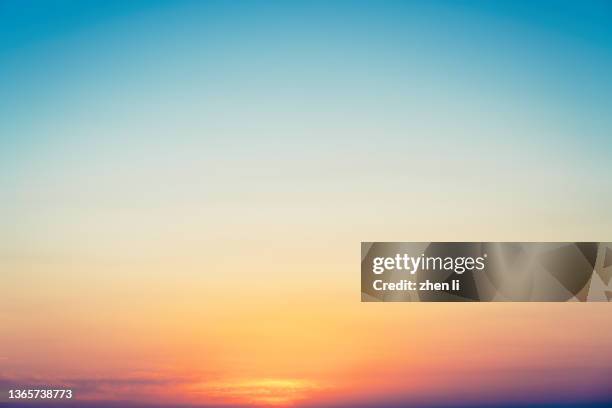 the gradient of the sky at sunset - atmospheric mood stock pictures, royalty-free photos & images