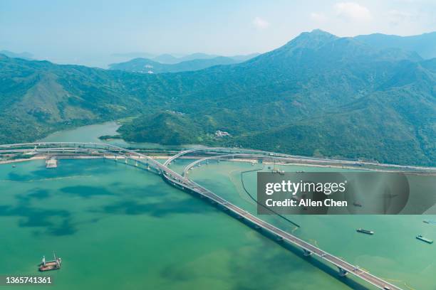 aerial photography of the sea near hong kong airport - hong kong convention and exhibition centre stock pictures, royalty-free photos & images