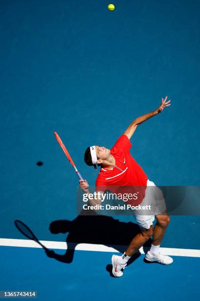 Taylor Fritz of United States serves in his second round singles match against Frances Tiafoe of United States during day four of the 2022 Australian...