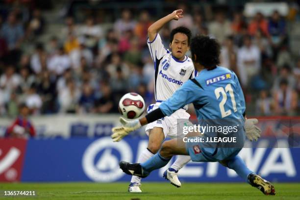 Takahiro Futagawa of Gamba Osaka scores his side's second goal during the J.League J1 match between Omiya Ardija and Gamba Osaka at Saitama City...