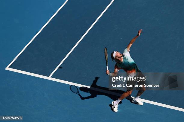 Stefanos Tsitsipas of Greece serves in his second round singles match against Sebastian Baez of Argentina during day four of the 2022 Australian Open...