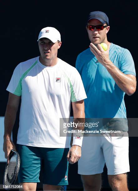 Dominic Inglot and Ken Skupski of Great Britain talk tactics in their first round doubles match against Tallon Griekspoor of the Netherlands and...