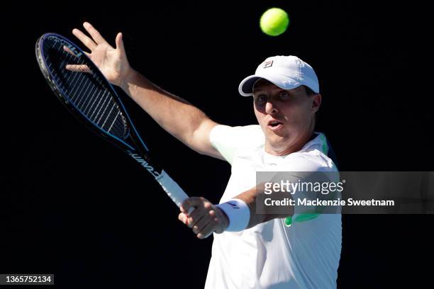 Ken Skupski of Great Britain plays a backhand in his first round doubles match against Tallon Griekspoor of the Netherlands and Andrea Vavassori of...