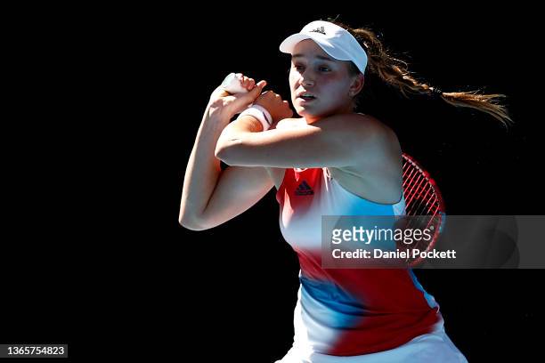 Elena Rybakina of Kazakhstan plays a backhand in her second round singles match against Shuai Zhang of China during day four of the 2022 Australian...