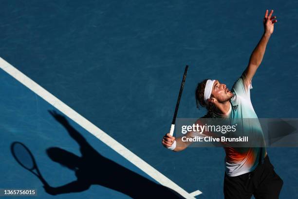 Stefanos Tsitsipas of Greece serves in his second round singles match against Sebastian Baez of Argentina during day four of the 2022 Australian Open...