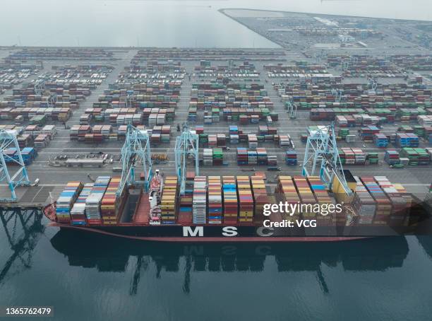 Aerial view of containers and cargo ships at the Port of Los Angeles on January 19, 2022 in San Pedro, California.