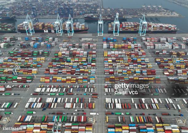 Aerial view of containers and cargo ships at the Port of Los Angeles on January 19, 2022 in San Pedro, California.