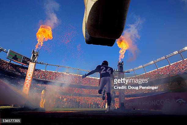 Champ Bailey of the Denver Broncos runs on to the field prior to the AFC Wild Card Playoff game against the Pittsburgh Steelers at Sports Authority...