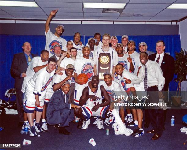 The University of Connecticut men's basketball team celebrates in the lockerroom after wining the 1999 NCAA men's basketball championship, St....