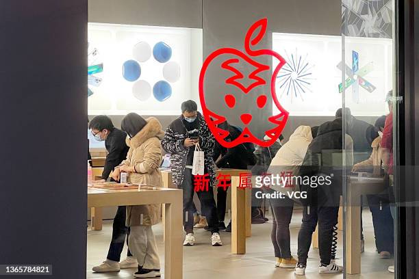 An Apple brand logo featuring a tiger face is seen at the Apple store in Xidan Joy City shopping mall ahead of Chinese new year, the Year of the...