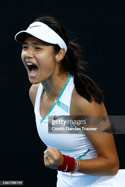 Emma Raducanu of Great Britain celebrates after winning a point in her second round singles match against Danka Kovinic of Montenegro during day four...