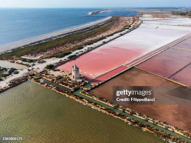 aerial view of pink salt flats in sicily, italy - marsala stock pictures, royalty-free photos & images