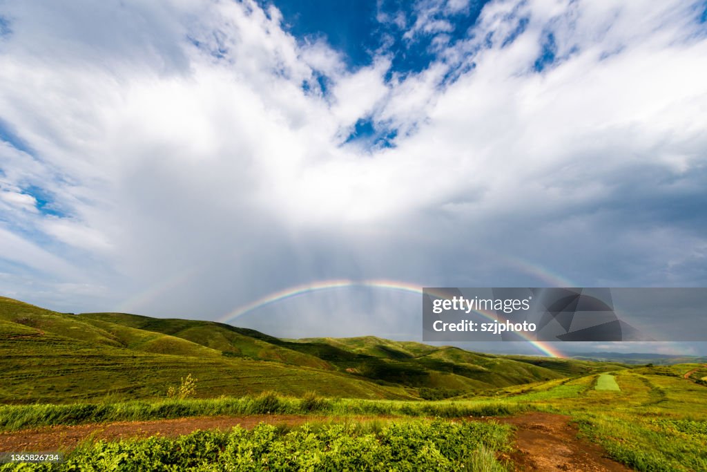 Grassland Raining Rainbow On Grassland After Rain High-Res Stock Photo - Getty Images