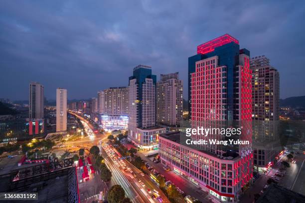 city night view of anshun city, guizhou province, china - guizhou province imagens e fotografias de stock