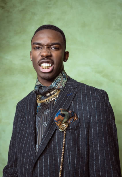 Gold Tooth Rapper 12 Rapper Gold Teeth Stock Photos, High-Res Pictures, and Images ...