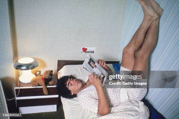 Young Diego Maradona relaxing at home circa 1980.