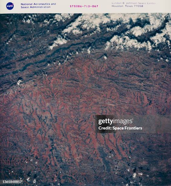 View of the South Central Plateau, Madagascar, with the Antalvodro Massif also visible, as seen during Space Shuttle Atlantis mission STS-86, 3rd...